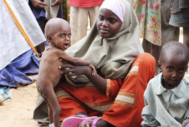 USAfrica: The ugly truths of Famine and Genocide in Somalia. By Ben Barber