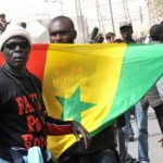 Senegal opposition marches against 85-year-old president Wade's 3rd term bid.   