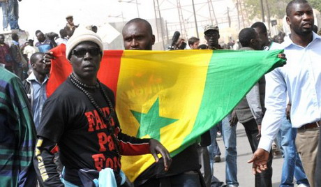 Senegal opposition marches against 85-year-old president Wade's 3rd term bid.   