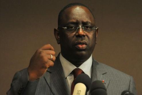 Senegal's Macky Sall sworn in as president; says "several emergencies" ahead