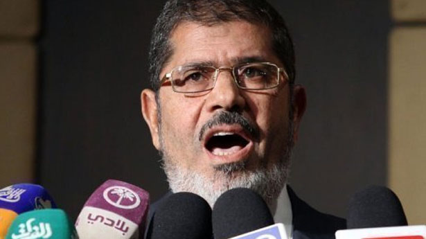 SHOWDOWN: Deposed Egyptian president Morsi of Muslim Brotherhood on trial; Death penalty, life sentence possible