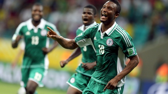 Nigeria’s coach Keshi, Mikel Obi blame American referee for loss to France.