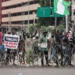 Nigeria: Police fire tear gas on protesters in Abuja and Kano