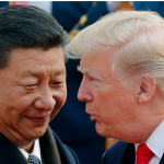 US President Donald Trump chats with Chinese President Xi Jinping during a welcome ceremony at the Great Hall of the People in Beijing on Nov. 9, 2017.