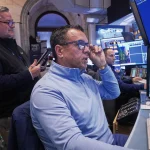 U.S. stocks dip on global rate fears, crypto losses