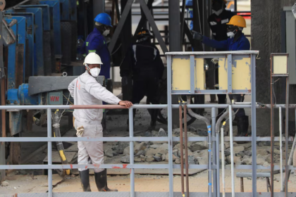 Workers work at Prospect Lithium Zimbabwe mine in Goromonzi, Zimbabwe, January 9, 2024.