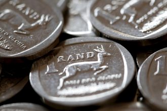 South African rand gains ground as gold rebounds above $4,900.