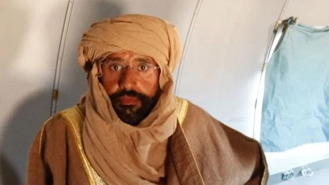 Gaddafi's son arrested in Libya; intelligence network crumbles